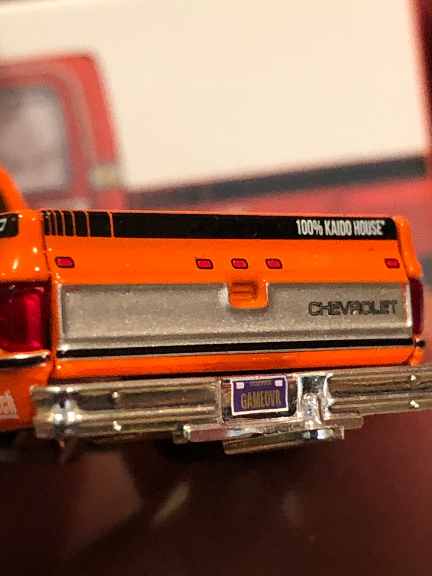 Kaido House x Mini GT 1:64 Chevrolet Silverado Dually KAIDO WORKS V2 – Orange