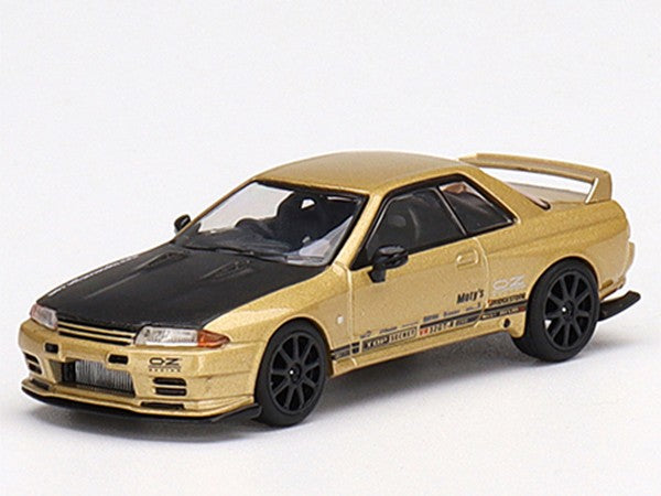 Mini GT 1:64 Nissan Skyline GT-R (R34) Top Secret – Gold – Japan Exclusive